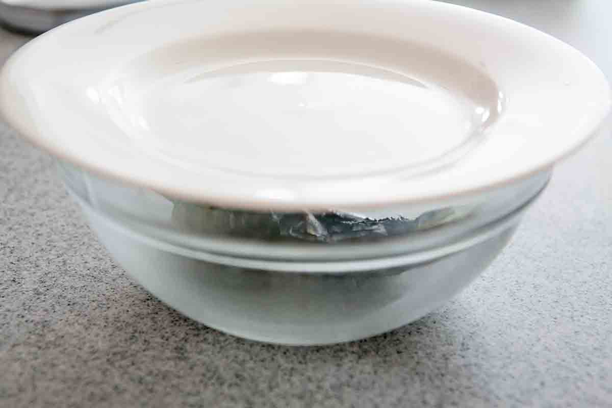 cover bowl with chile in it to steam the chile