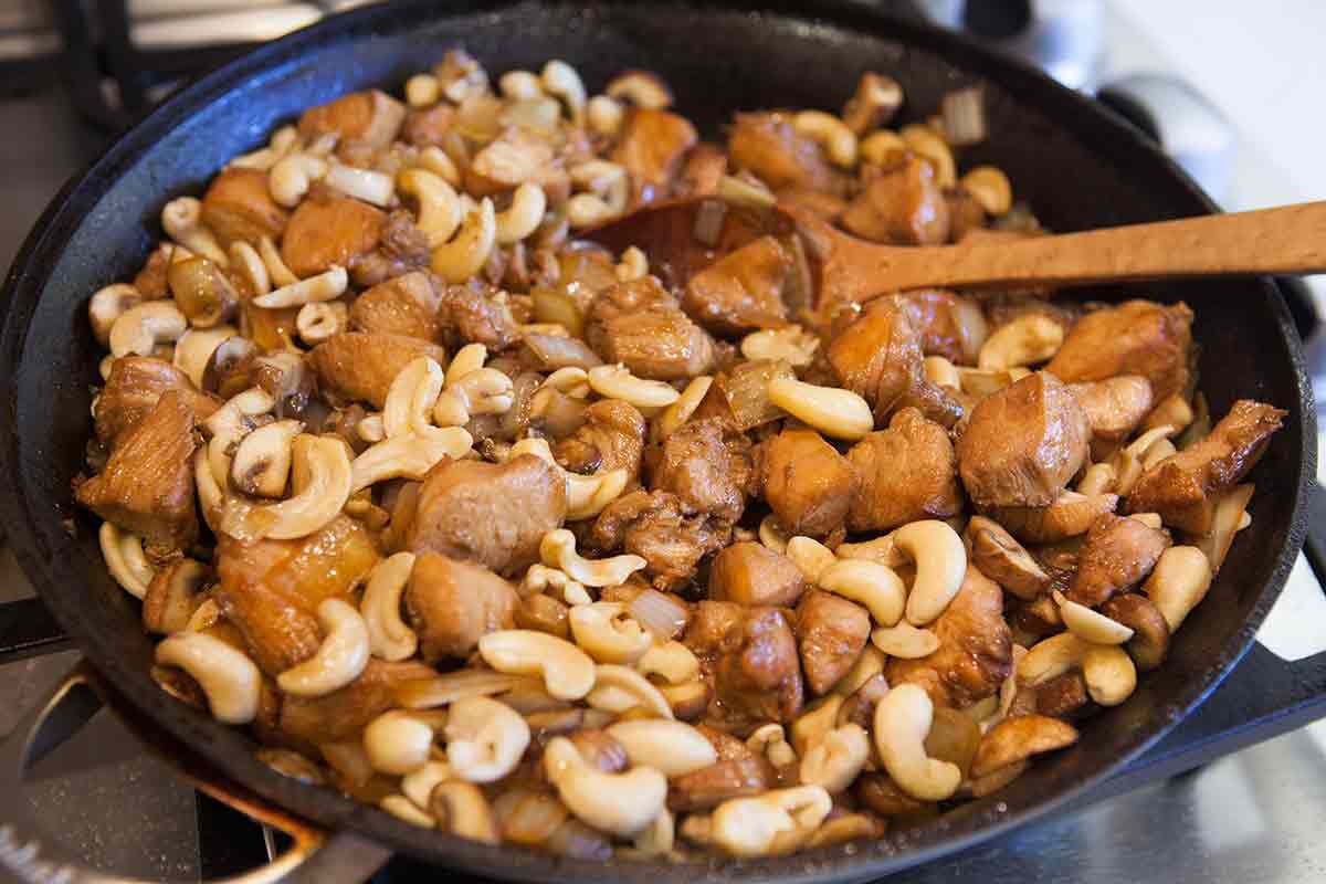 Cashew Chicken recipe add cashews to skillet
