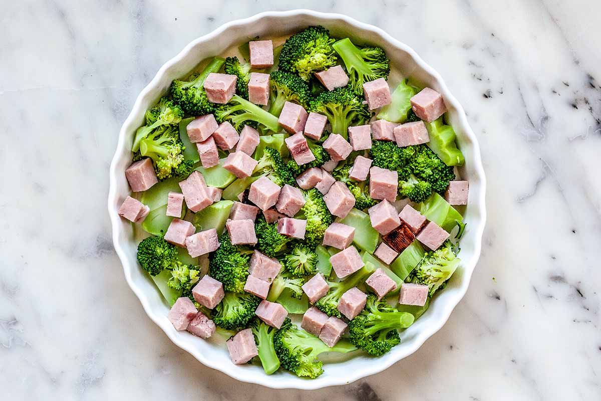 Breakfast Crustless Quiche - ham and broccoli in white dish