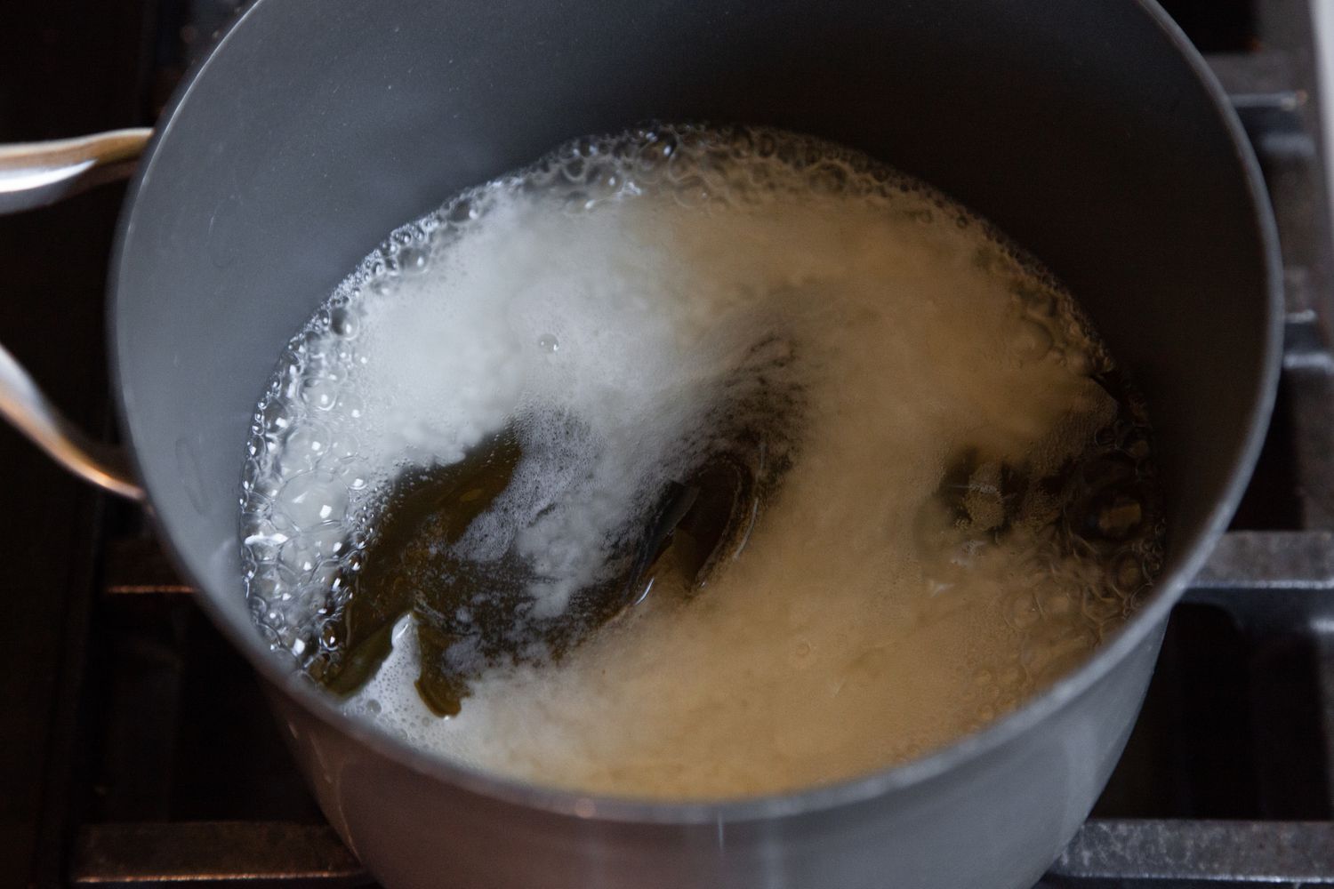 Pot of Rice and Kombu Boiling on Stove