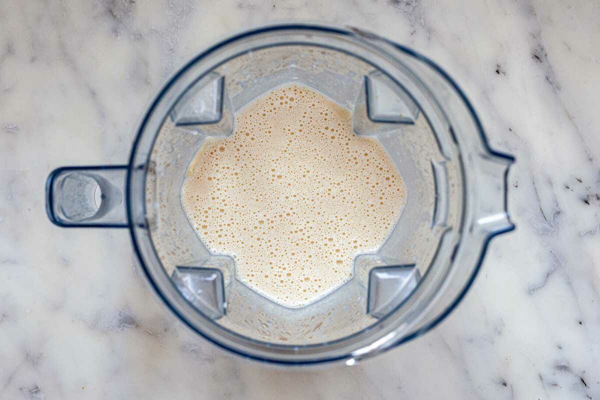 A blender with batter inside for the best popover recipe.