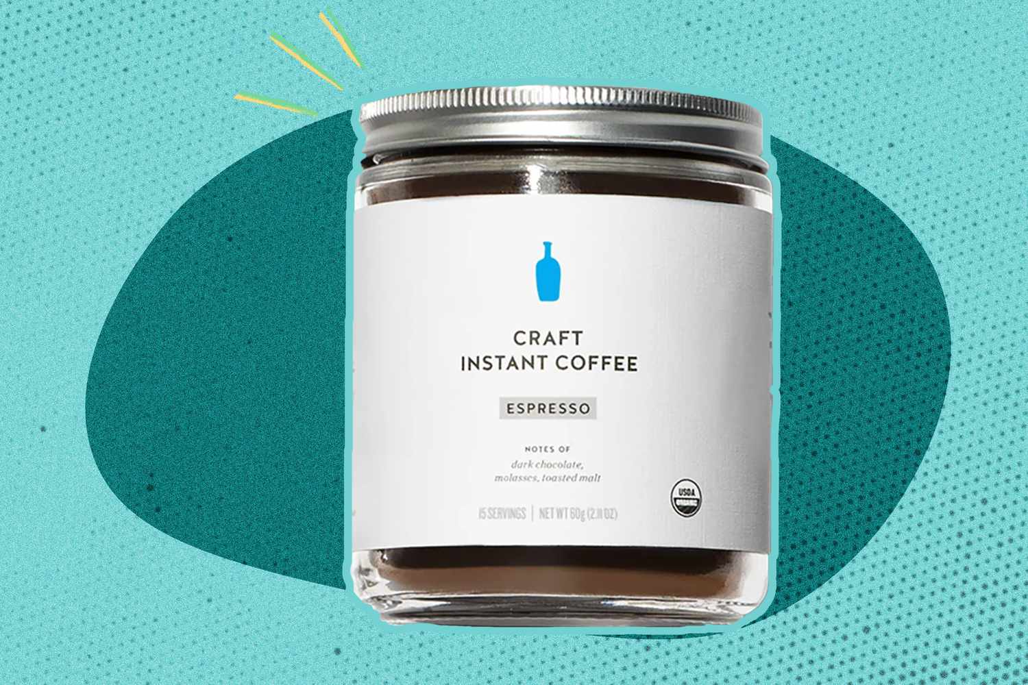 jar of "Craft Instant Coffee" granules on a graphic blue background