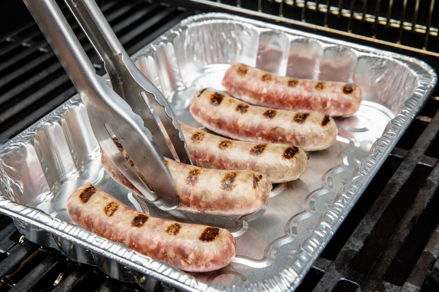 Beer Brats Placed on a Tray on the Grill