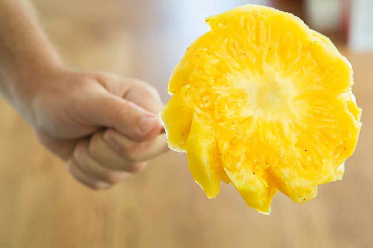 spear a pineapple round core with a fork and then just eat around the edges