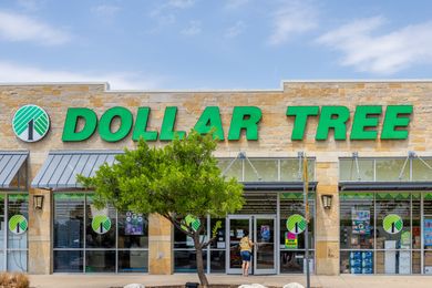 The facade of a Dollar Tree store with its logo prominently displayed on the building
