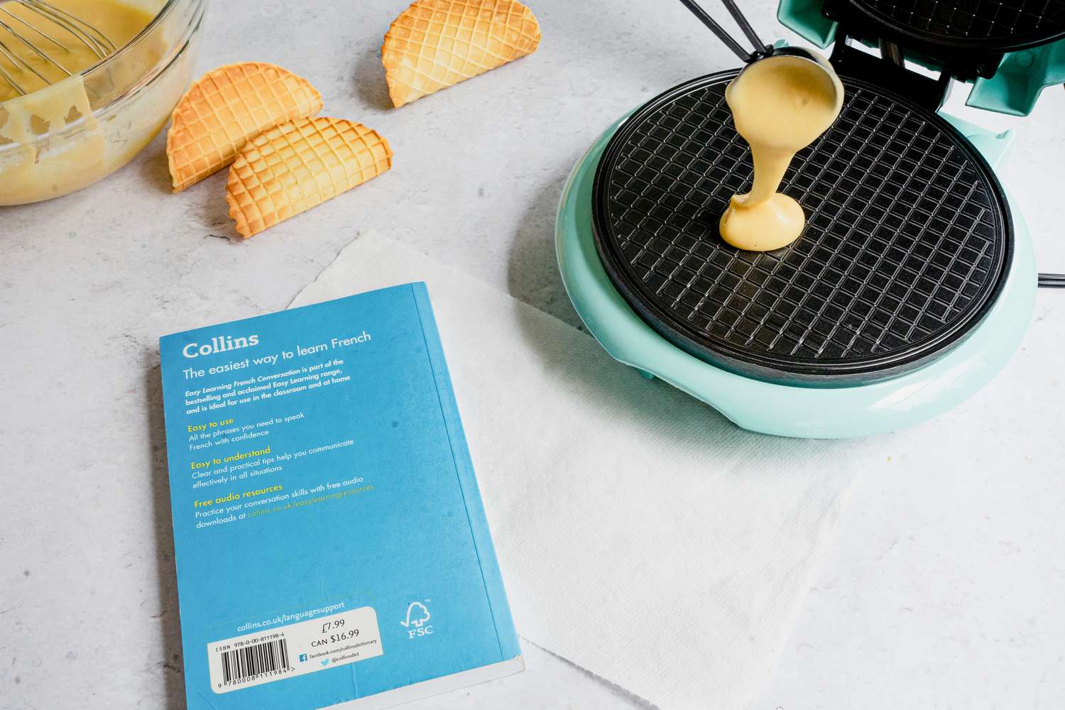 Pour 1 tablespoon batter into waffle cone maker.