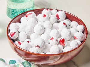 Bowl of sugared cranberries on a table