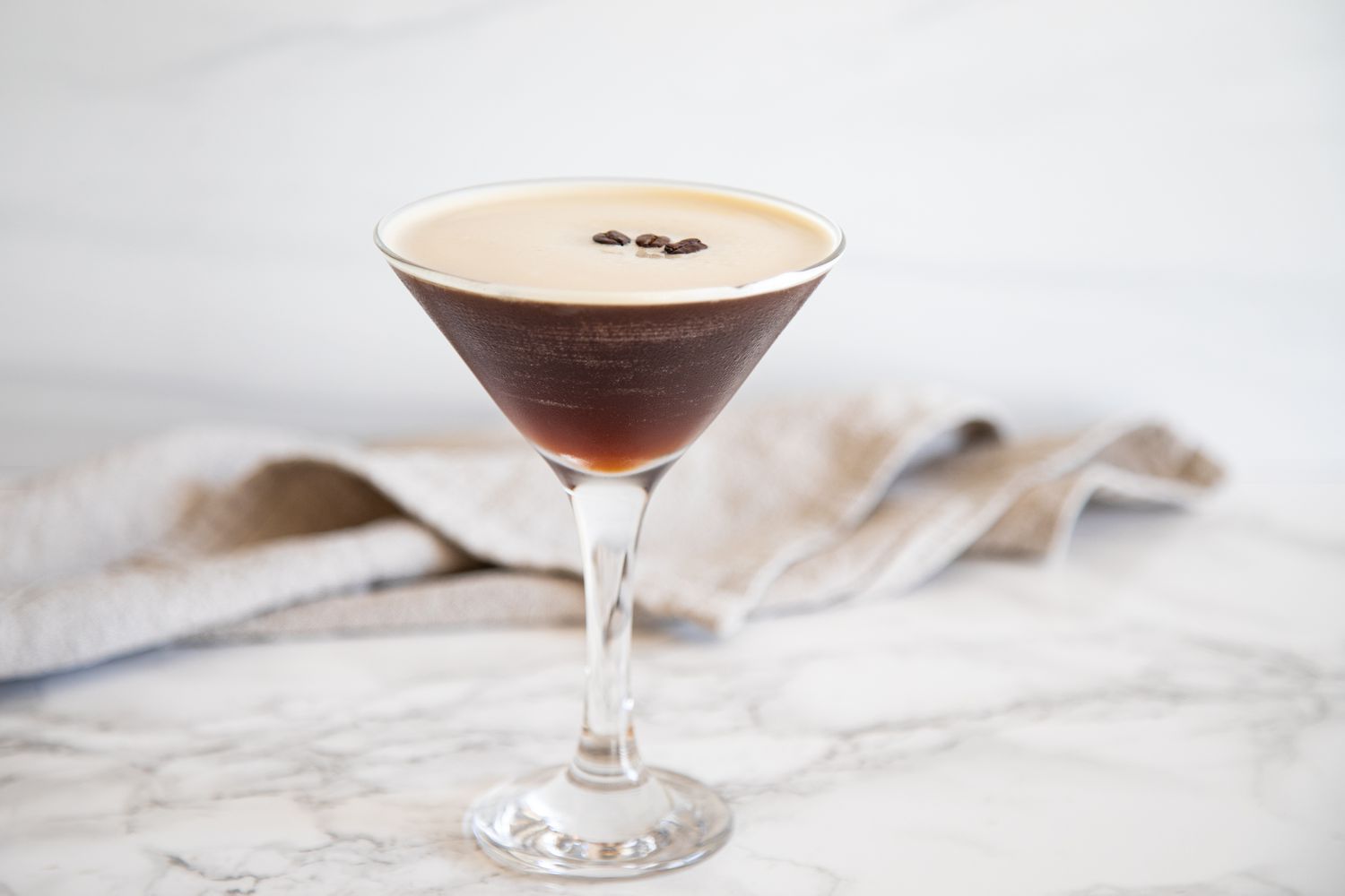 Espresso Martini Recipe served in a martini glass.