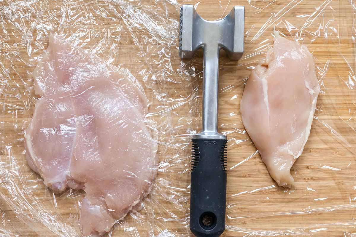 Easy Chicken Parmesan pound the cutlets with a mallet
