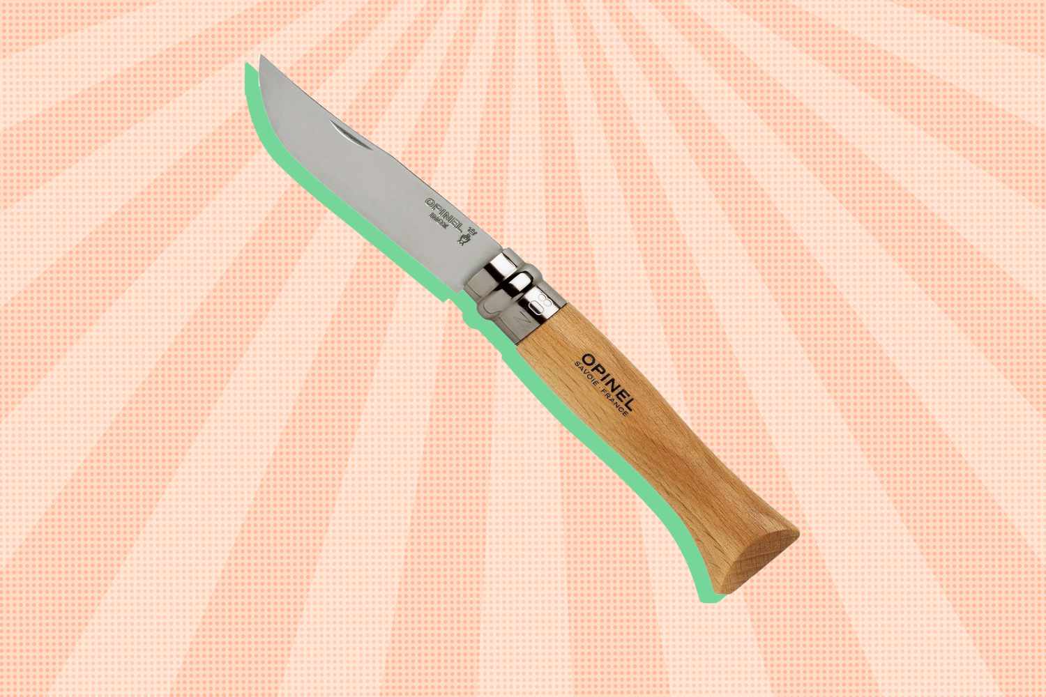 Folding knife with a wooden handle and a branded blade positioned against a patterned background