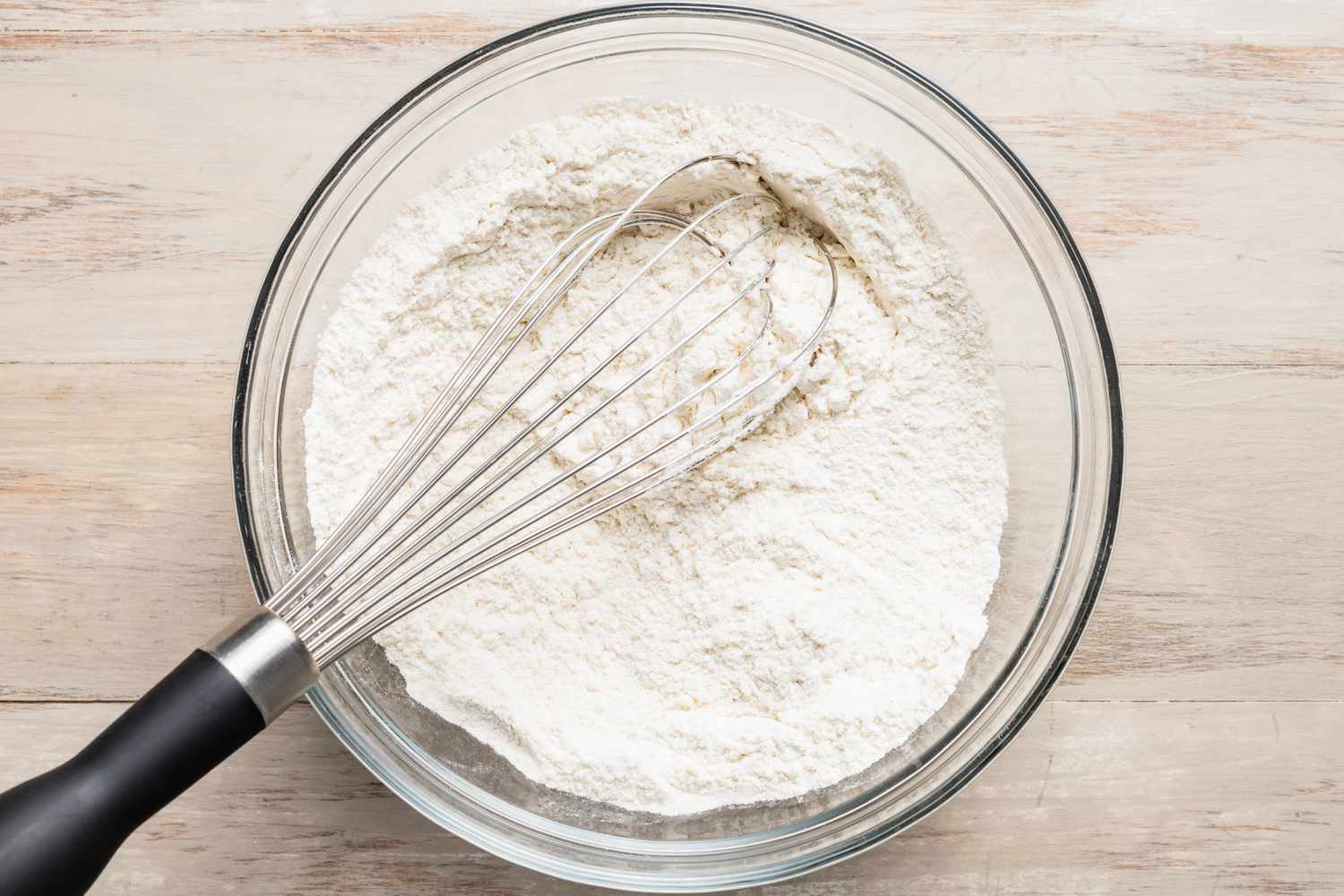 Bowl of dry ingredients whisked together for pumpkin spice snickerdoodle cookies recipe