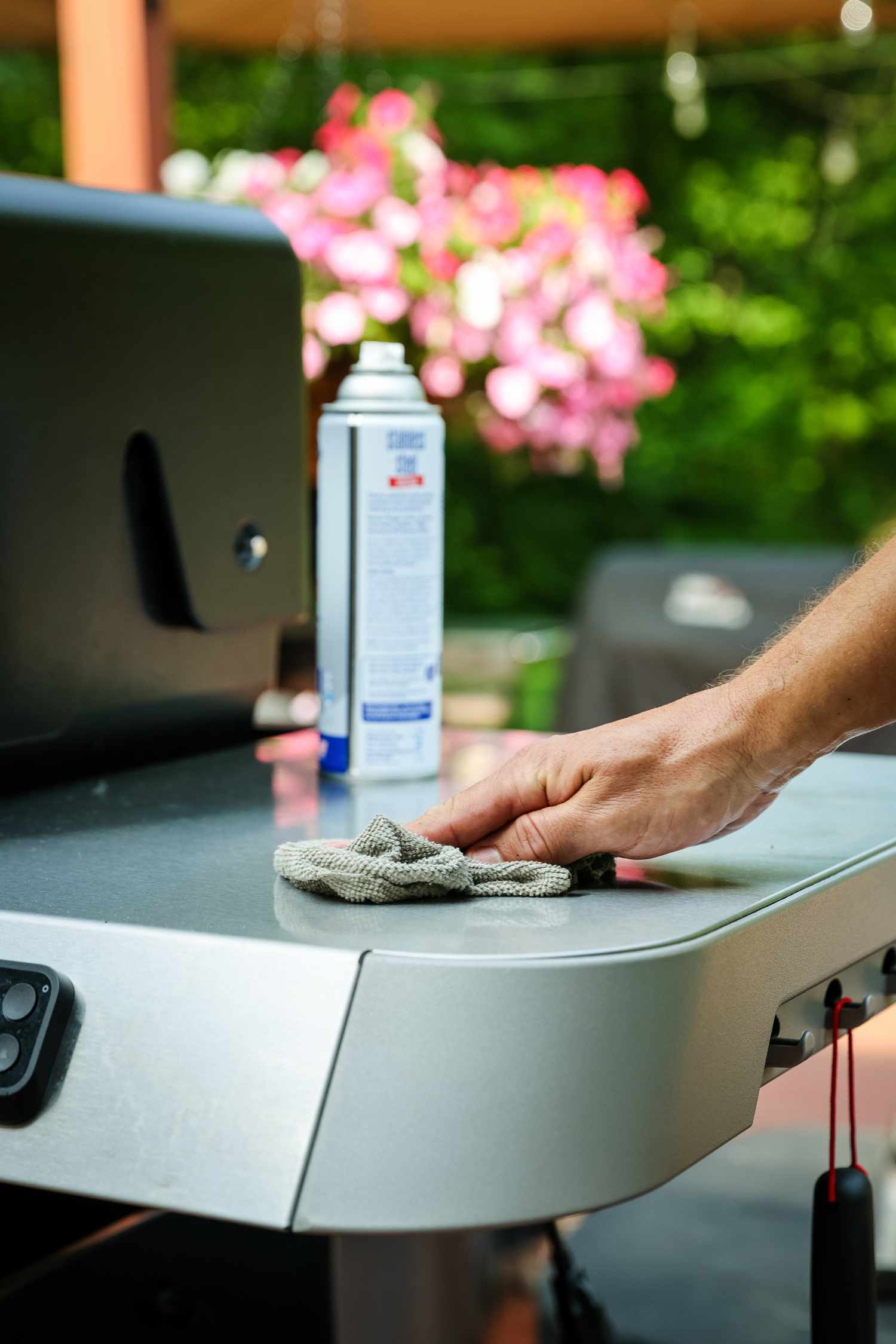 Surface of Gas Grill Wiped Using a Rag