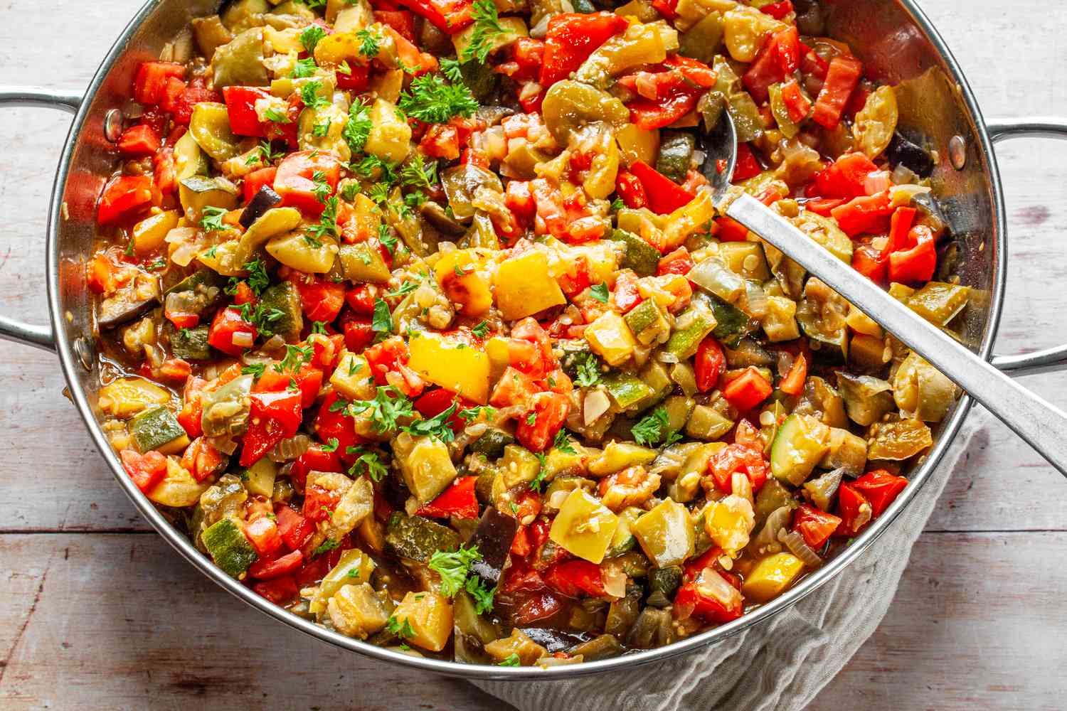 Pan of Classic Ratatouille with a Spoon