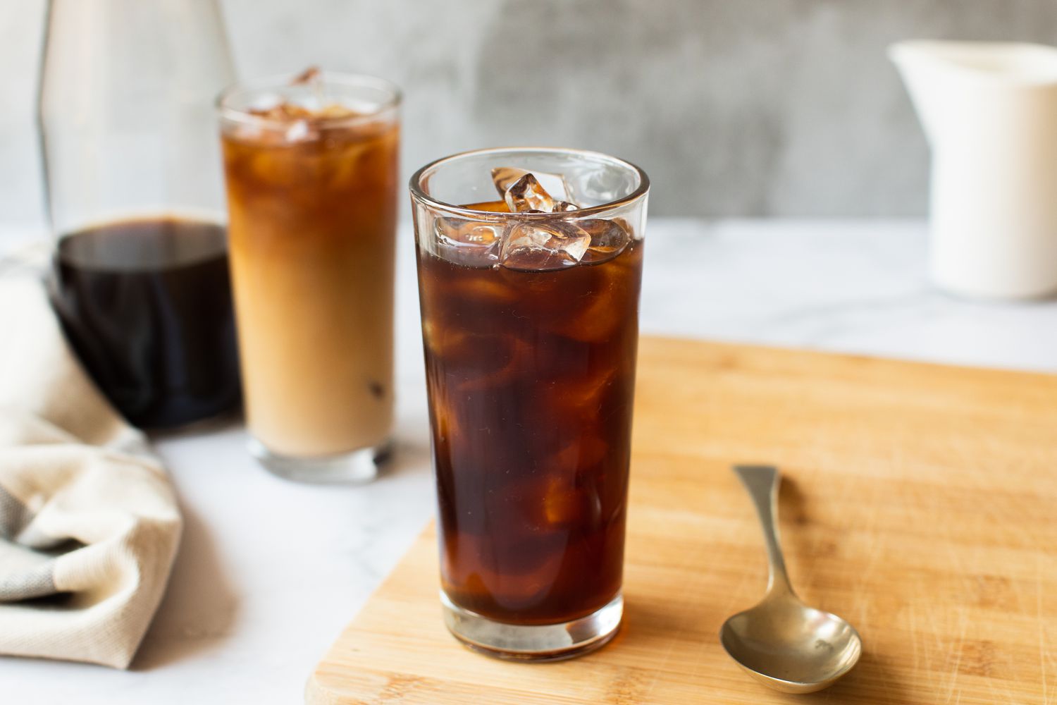 Two glasses with ice and cold brew coffee in them 