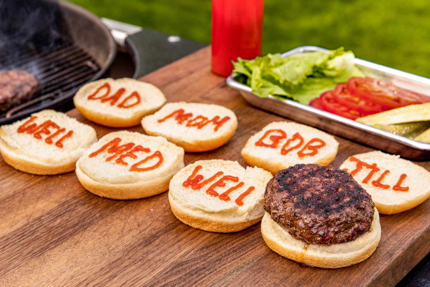 Labeled burger buns with one burger patty