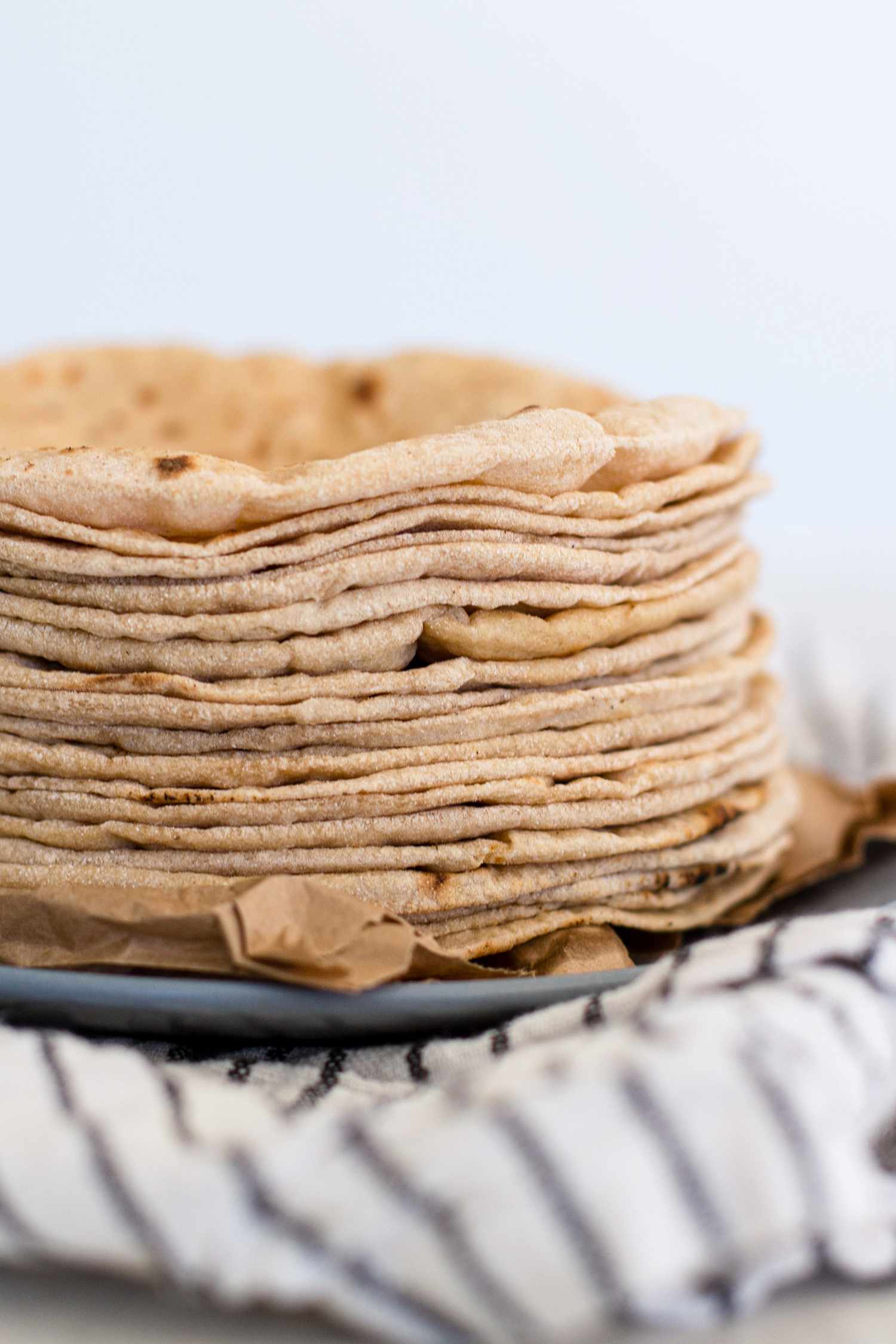 Side view of a large stack of chapati.