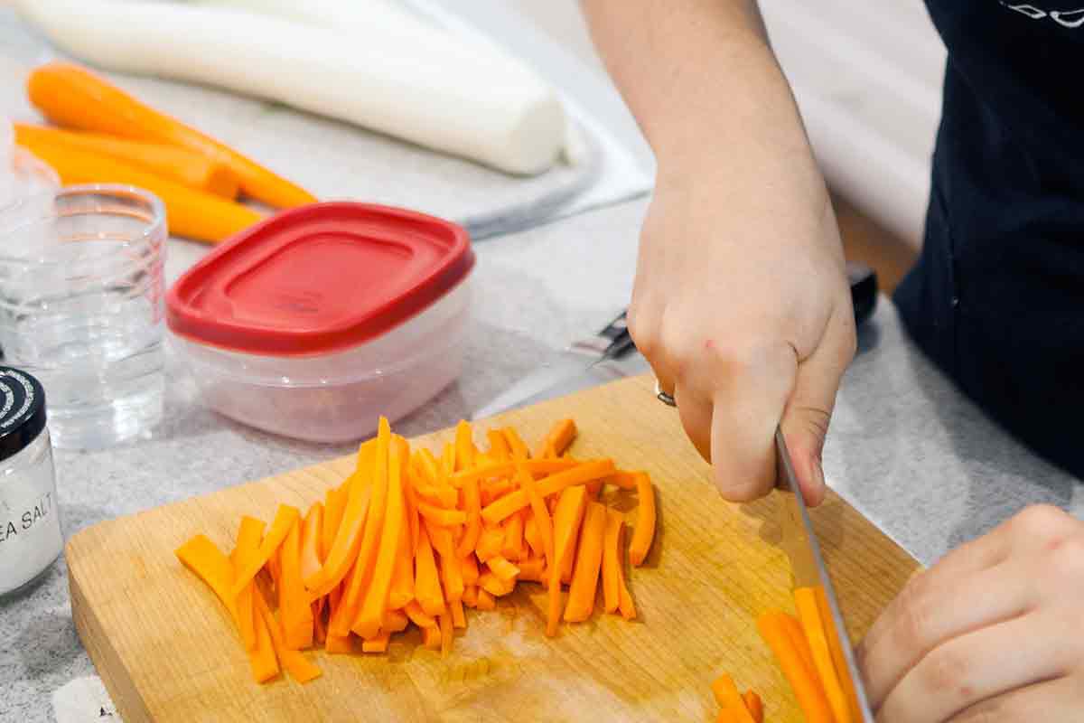 julienne carrots and daikon for vietnamese pickles
