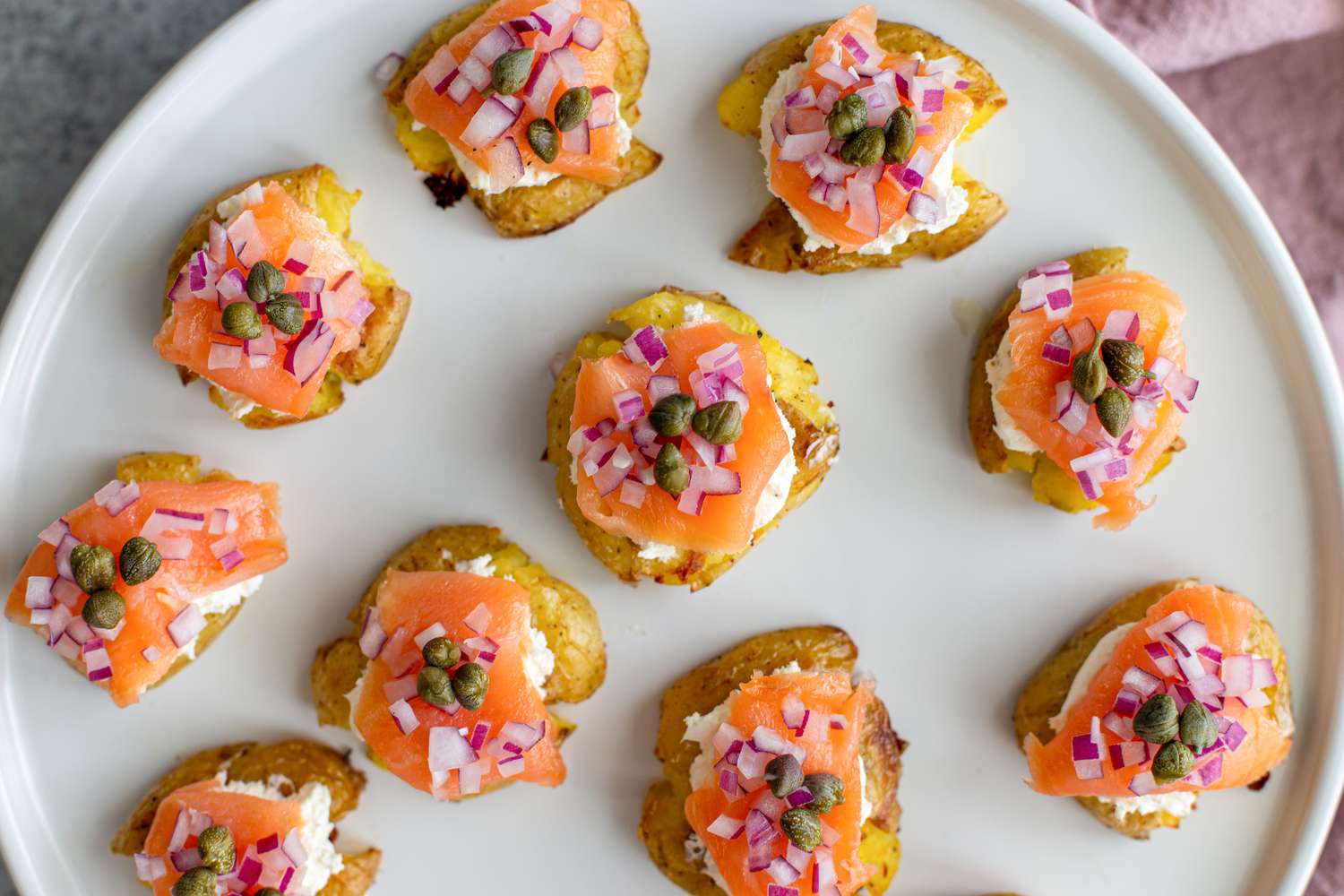 Overhead view of a platter of easy potato appetizers.