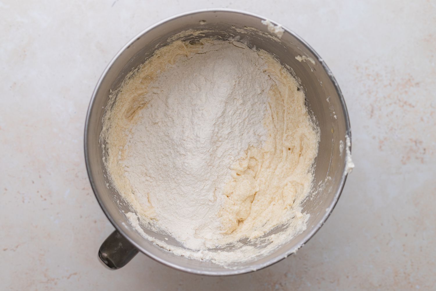 Mixing Dry Ingredients in a Mixing Bowl for Rainbow Layer Cake