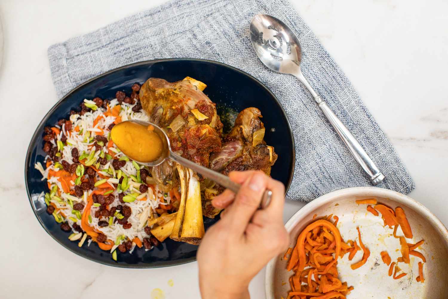 Assemble Kabuli Palao (Afghan Lamb Shanks with Rice, Carrots, and Raisins)