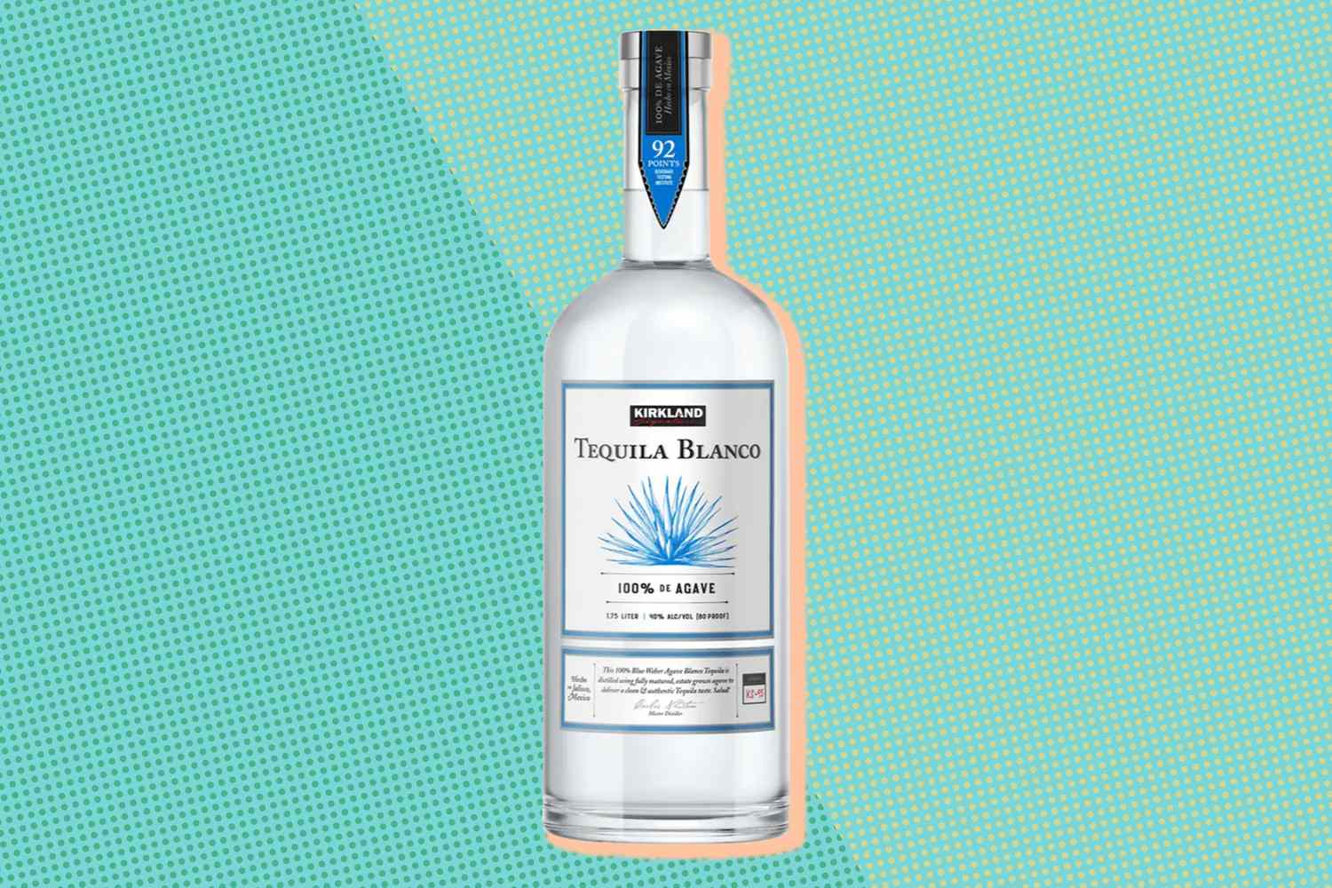 A bottle of Kirkland Signature Tequila Blanco on a textured background