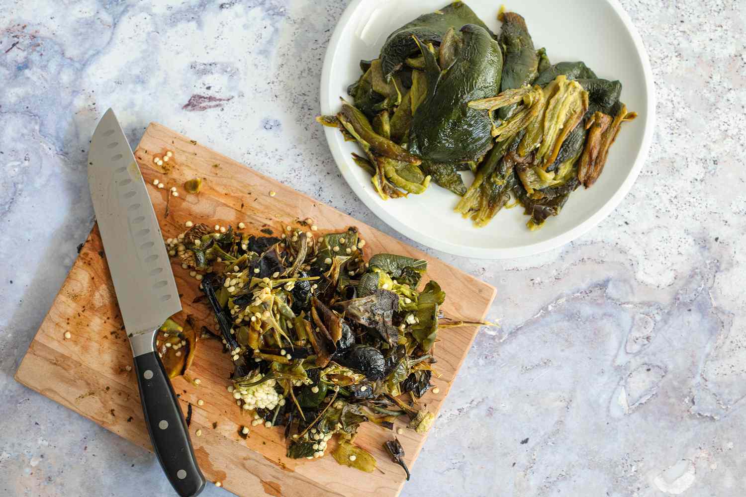 Peppers Skins and Seeds Removed and Leftover Peppers Placed on a Plate for Poblano, Corn, and Cheese Tamales 
