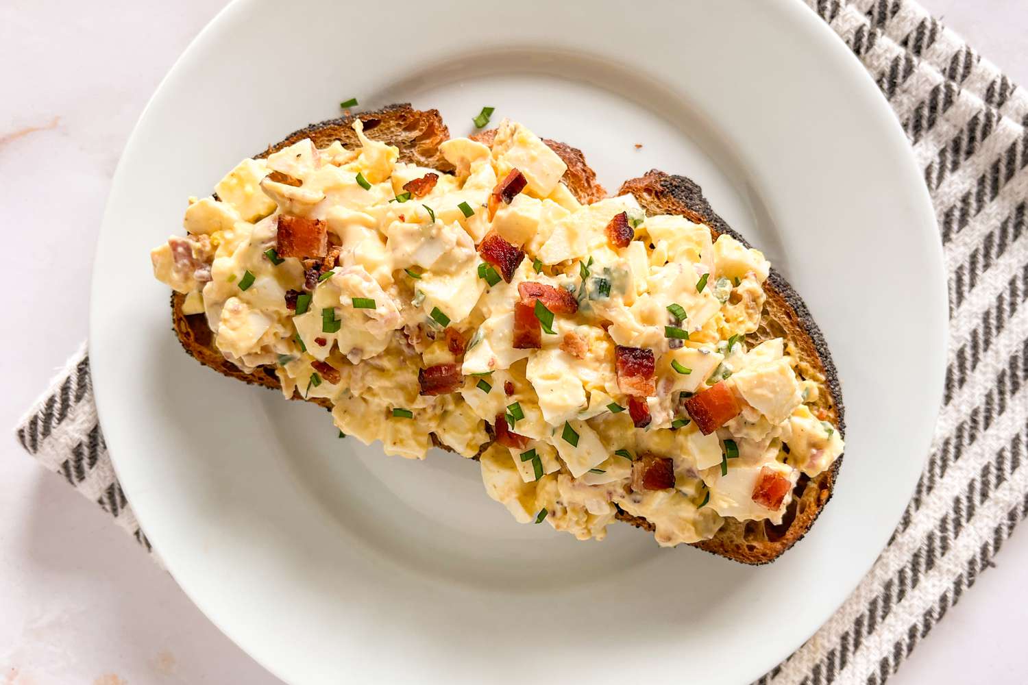 egg salad on toast on a plate