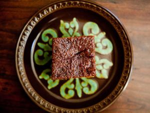 Single Piece of Gingerbread Cake on Decorative Plate