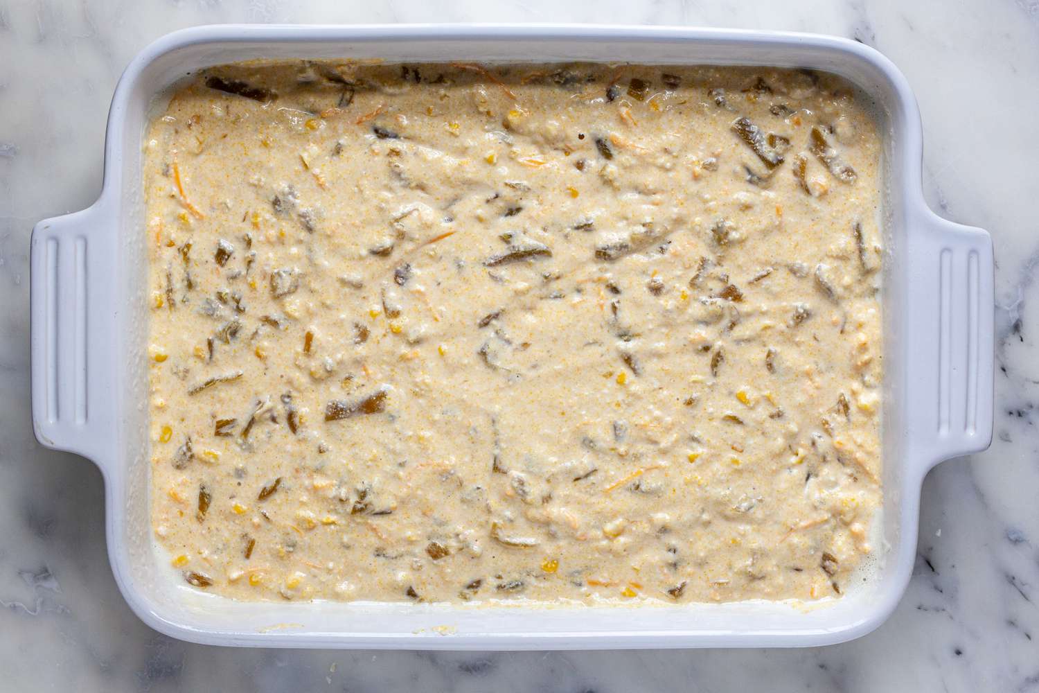 Green Chili Corn Bread Recipe Batter in Casserole Dish
