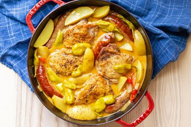 Chicken scarpariello in a red Dutch oven 