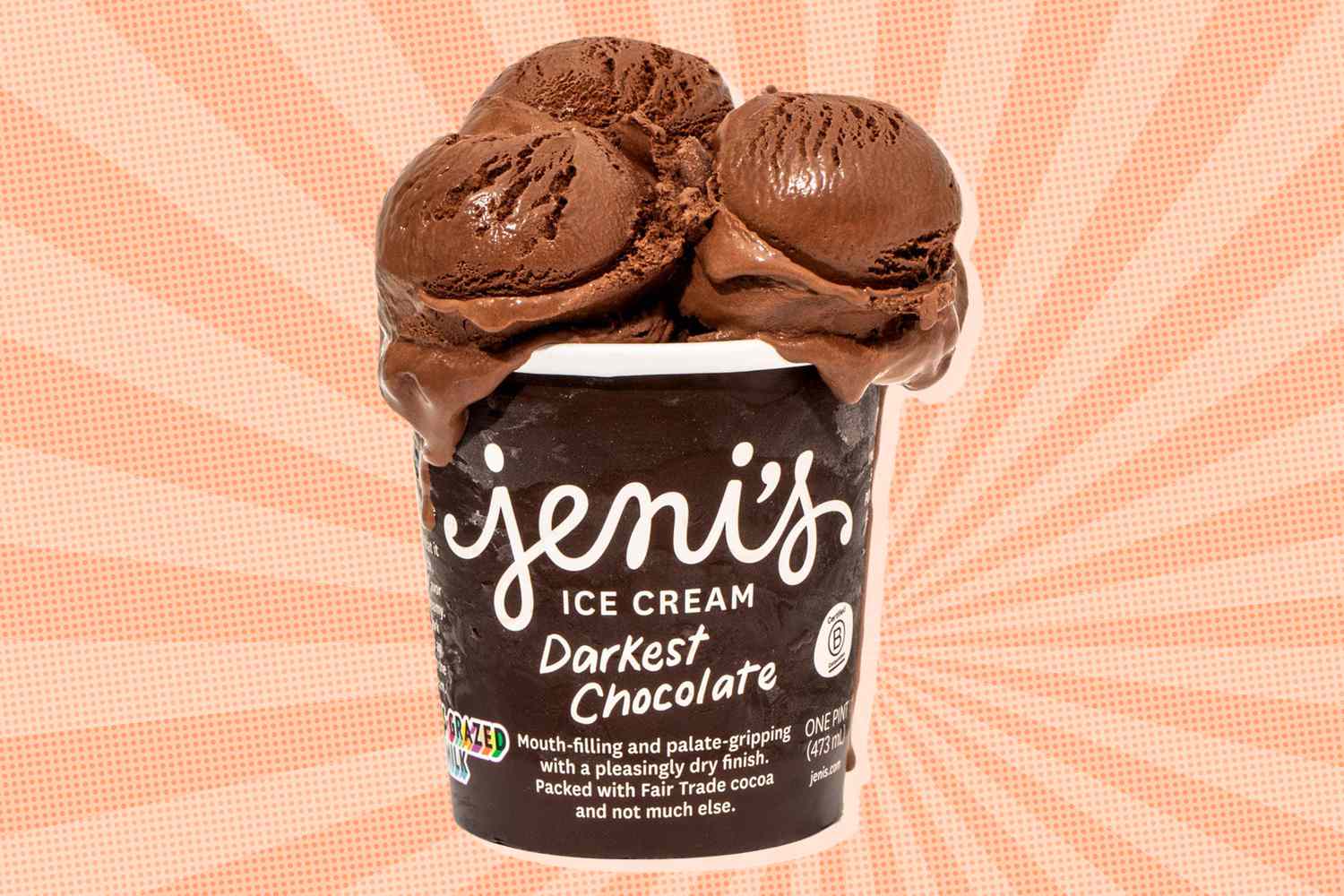 Jeni's Darkest Chocolate ice cream pint with scoops on top, displayed on an orange patterned background