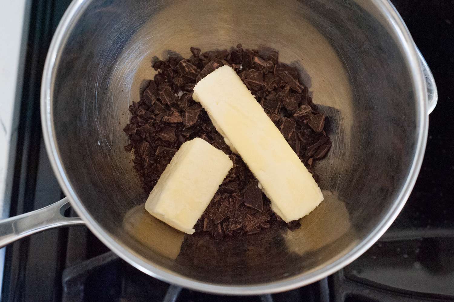 Butter and chocolate melting in a double boiler. 