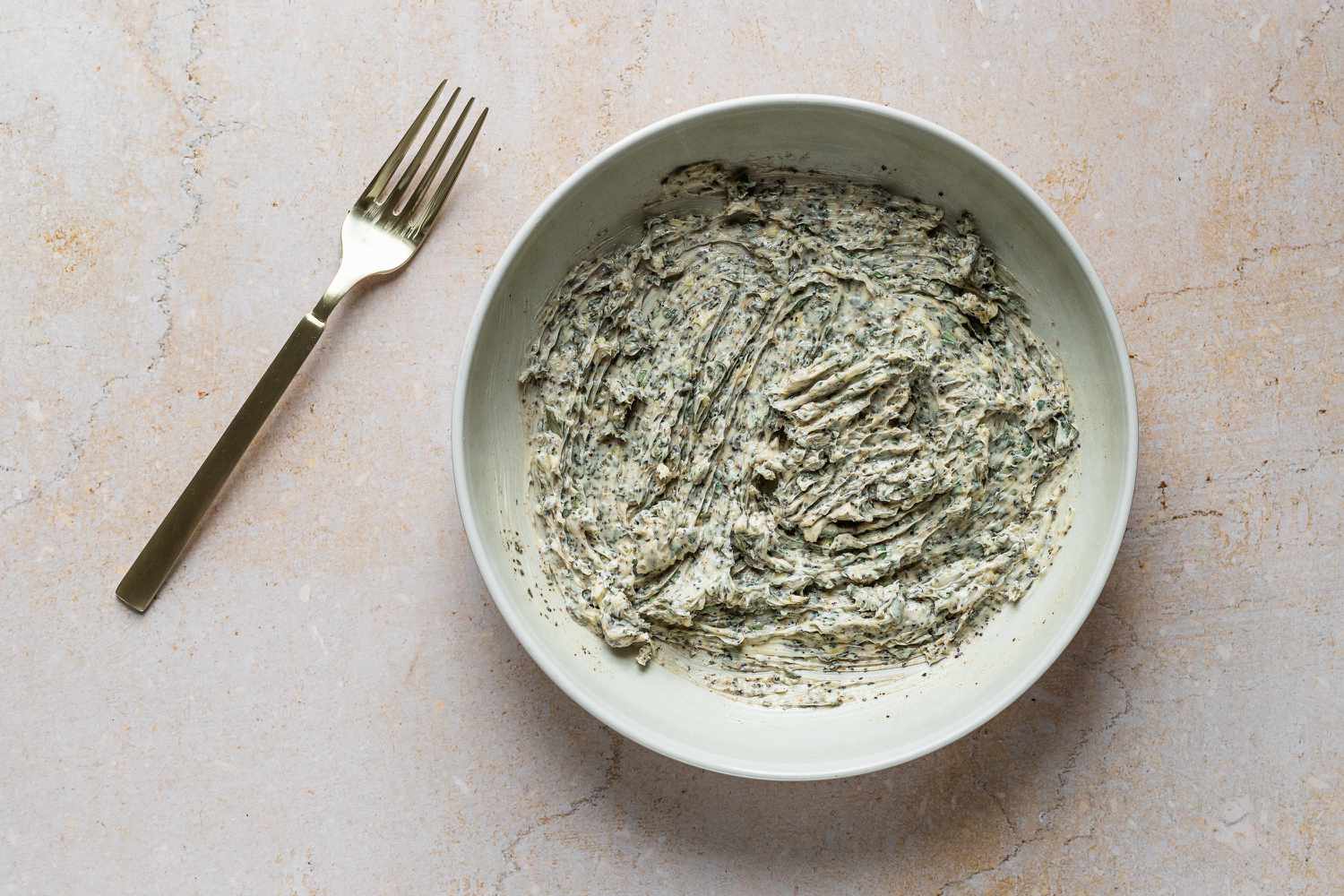 Turkey Compound Butter ingredients mixed together in a bowl 