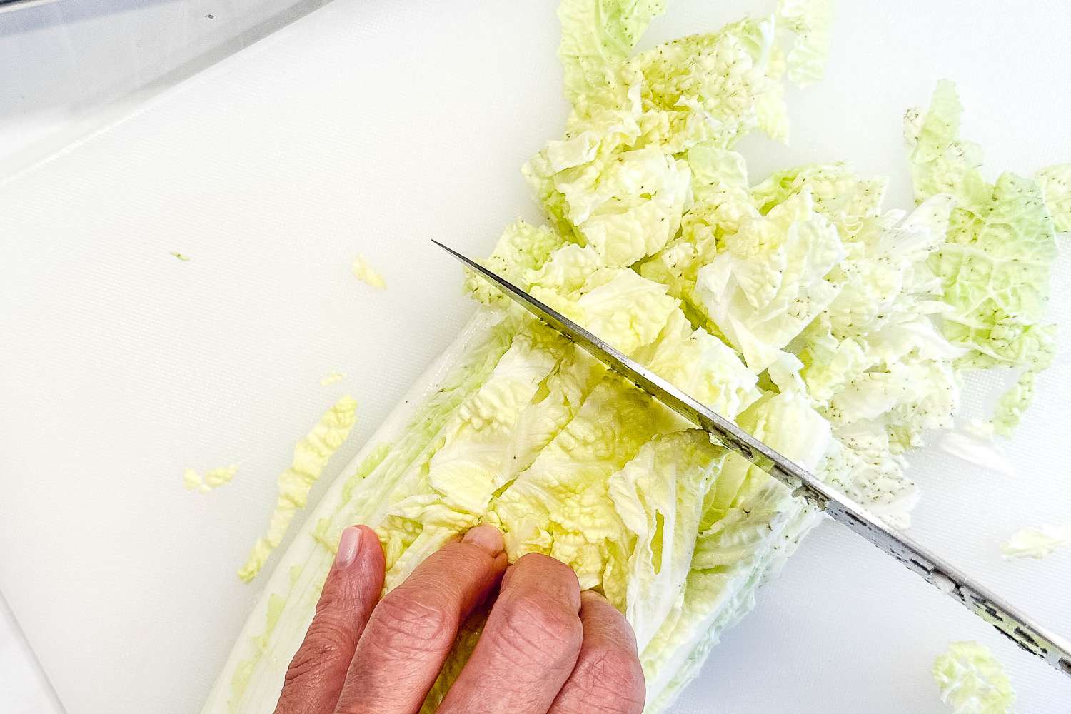 Napa cabbage cut into bite size pieces for budae jjigae (army base stew) recipe