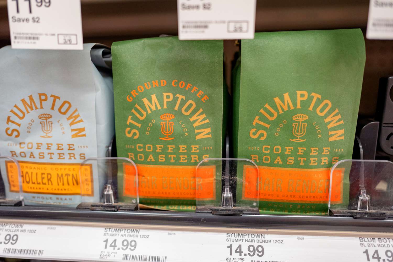 Selection of Stumptown coffee bags displayed on a store shelf with price tags visible