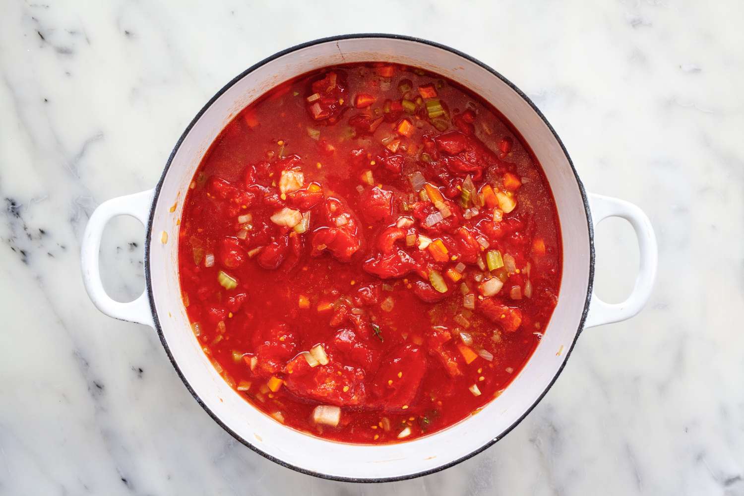 Tomatoes added to classical tomato sauce