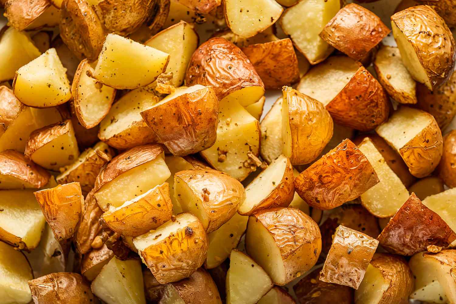 Golden-brown, seasoned, and roasted diced potatoes