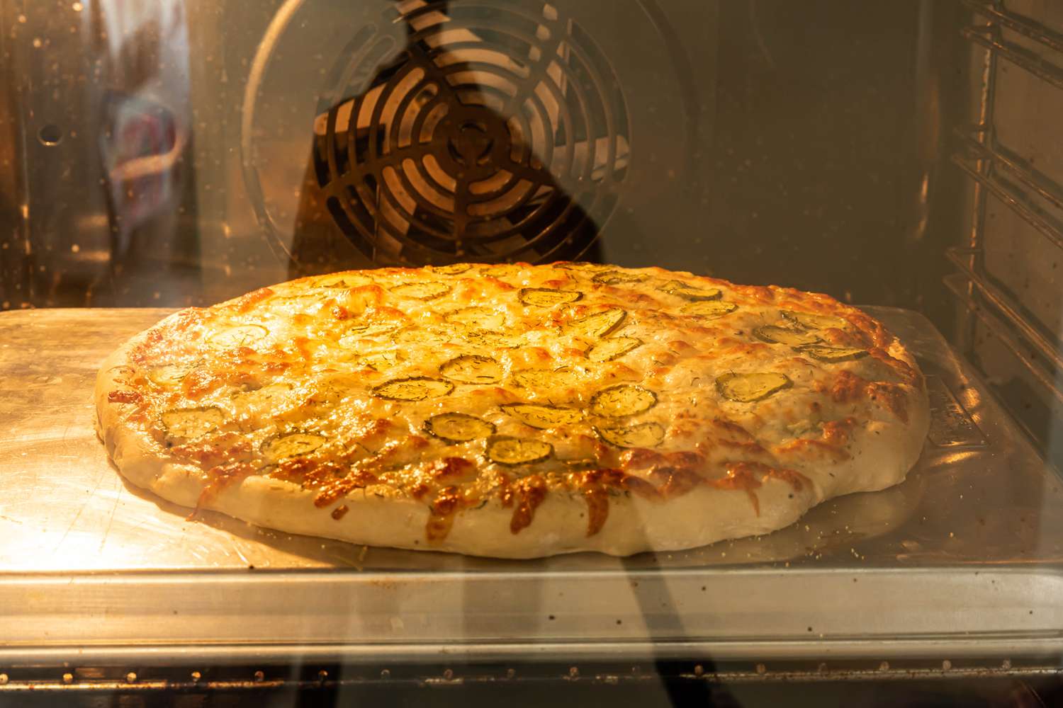 pickle pizza in the oven