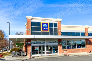 The exterior of an Aldi supermarket entrance