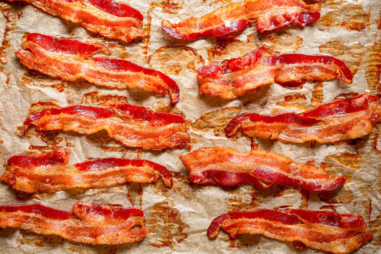 cooked bacon on a piece of parchment paper