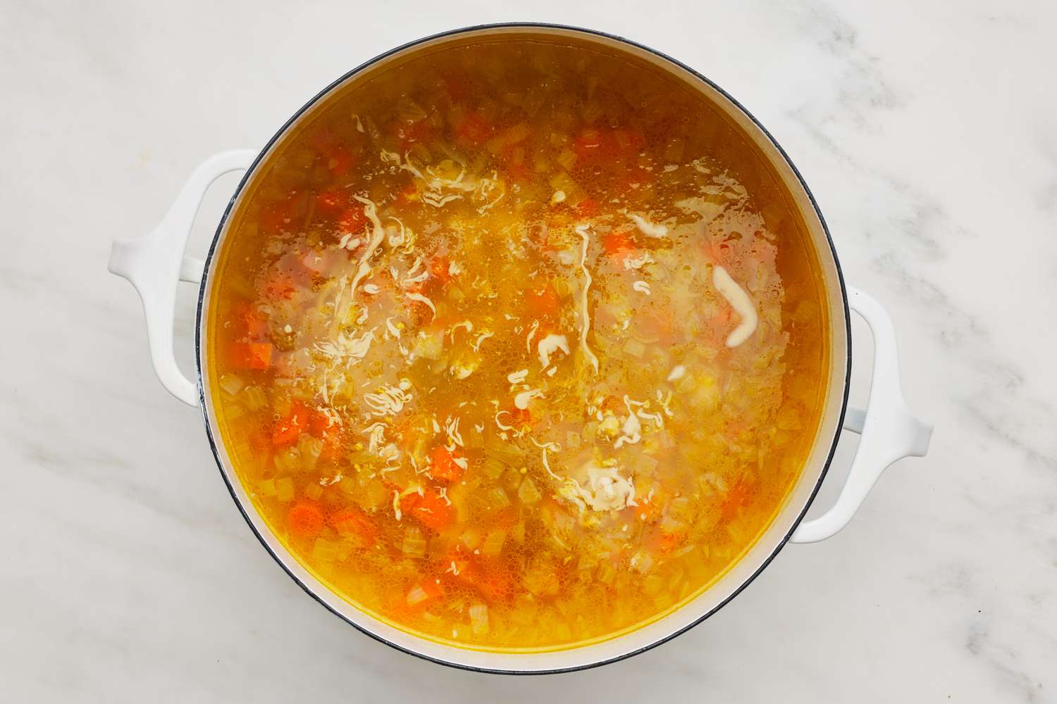 Hummus soup ingredient boiling in a Dutch oven 