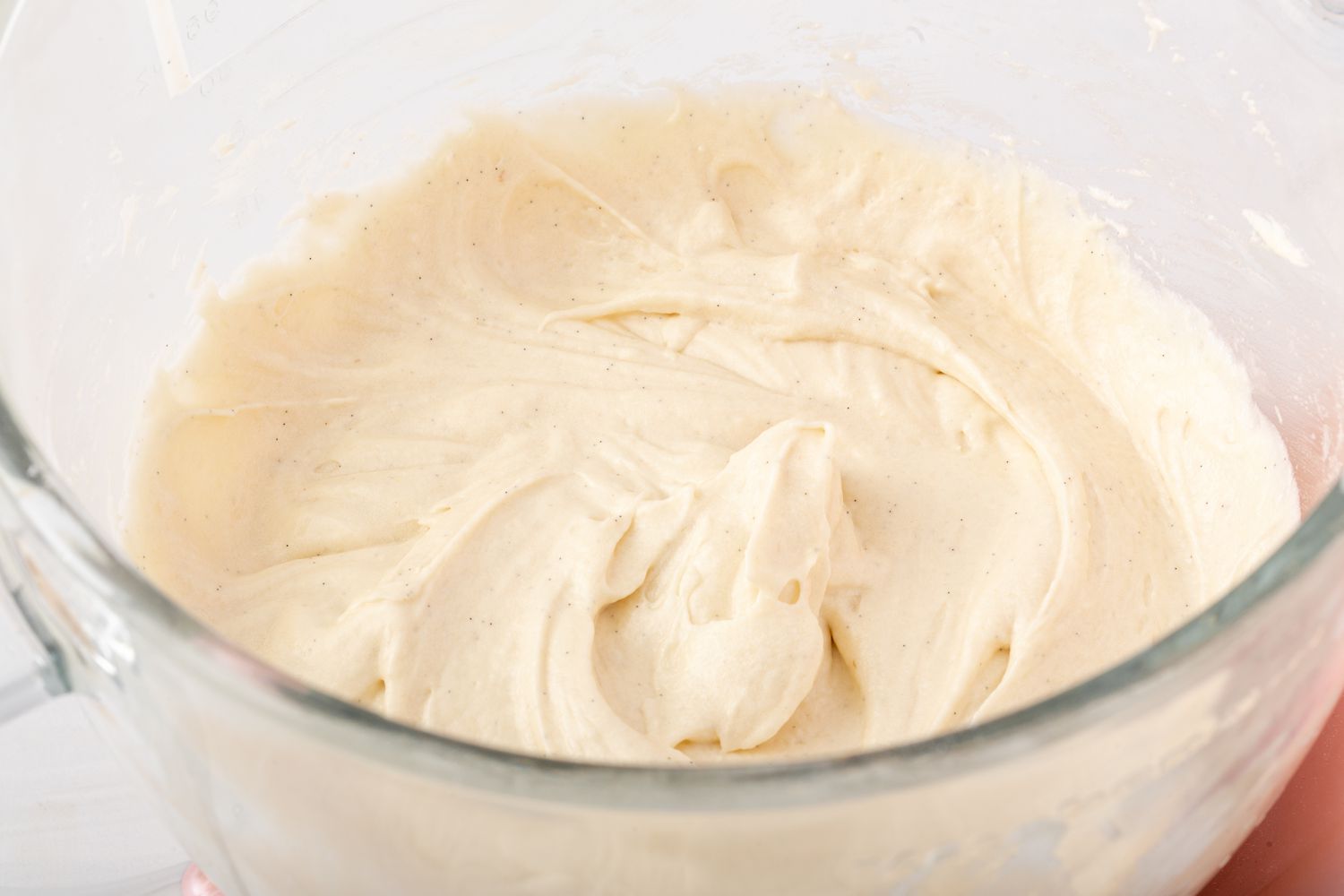 Batter in glass bowl for vanilla cupcakes from scratch.