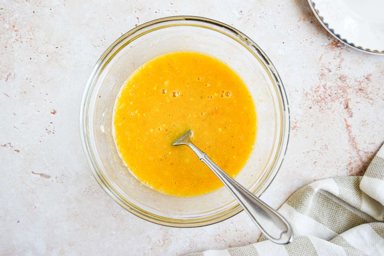 Eggs, Melted Butter, and Vanilla Extract Mixed with Mashed Bananas for Microwave Banana Bread Mug Cake Recipe