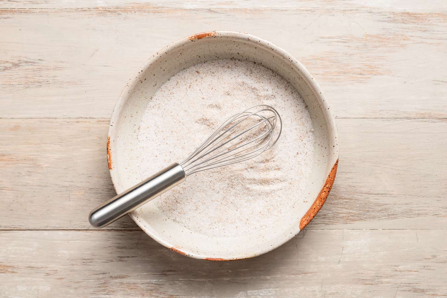 Pumpkin spice and sugar whisked together to make pumpkin spice sugar mixture for fall cookie recipe