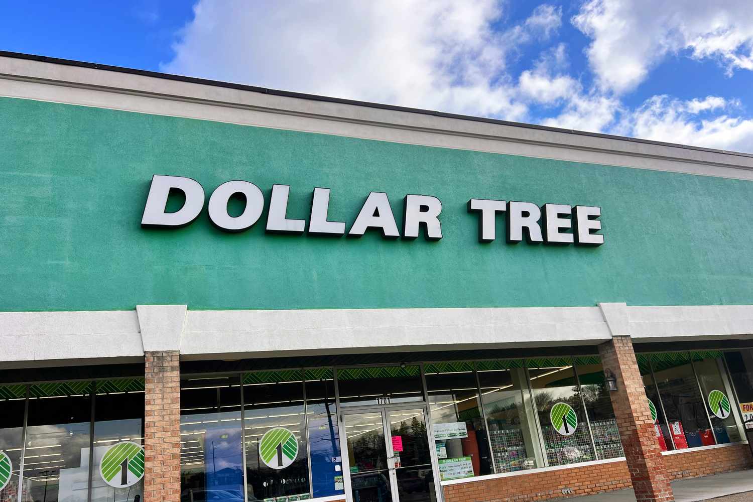Front view of a Dollar Tree store with its green signage and storefront visible