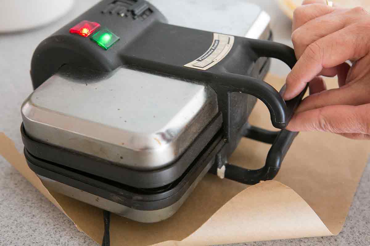 waffle iron cooking pumpkin waffles - yum!