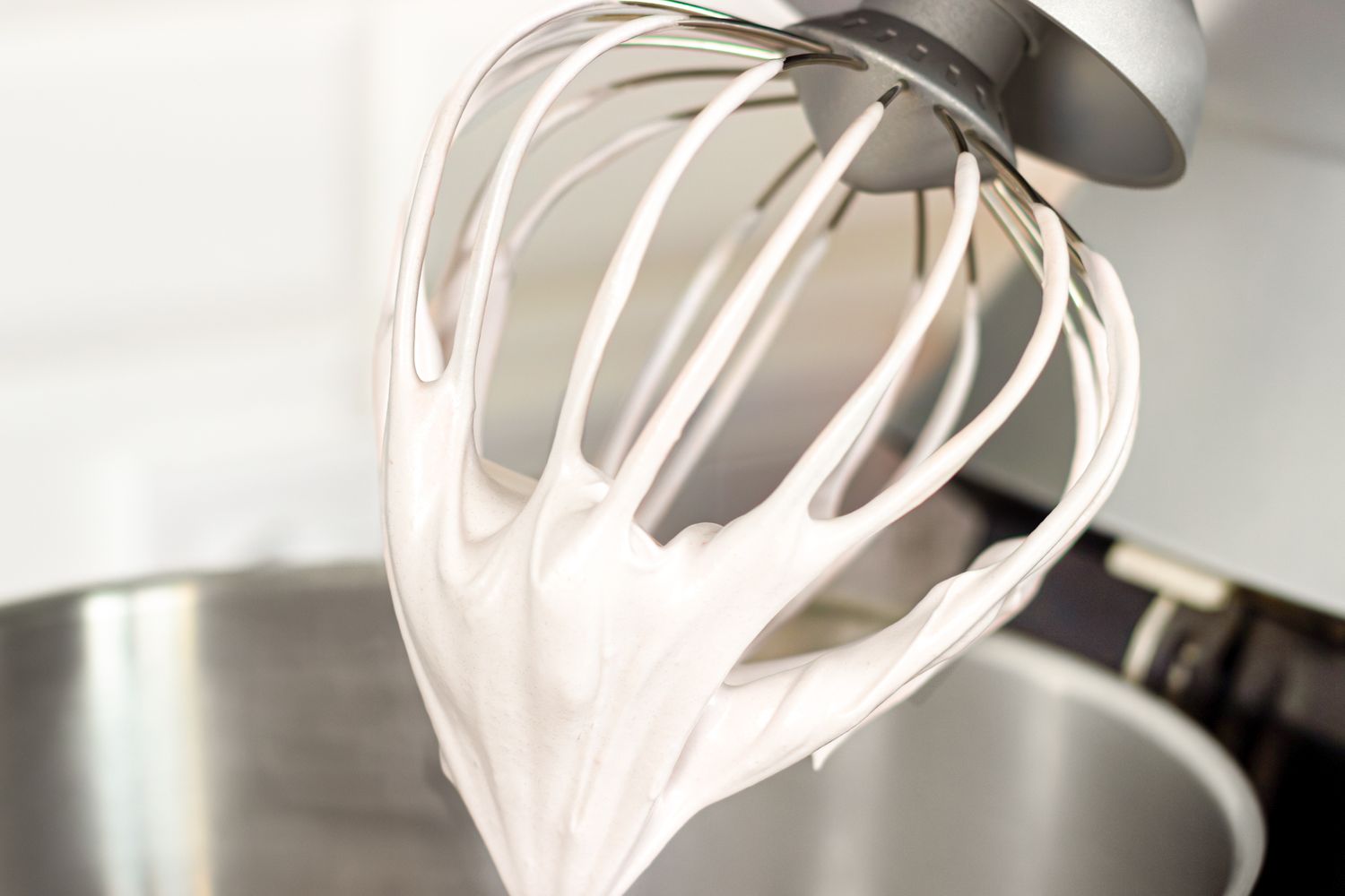 Whipped cream on a stand mixer whisk attachment