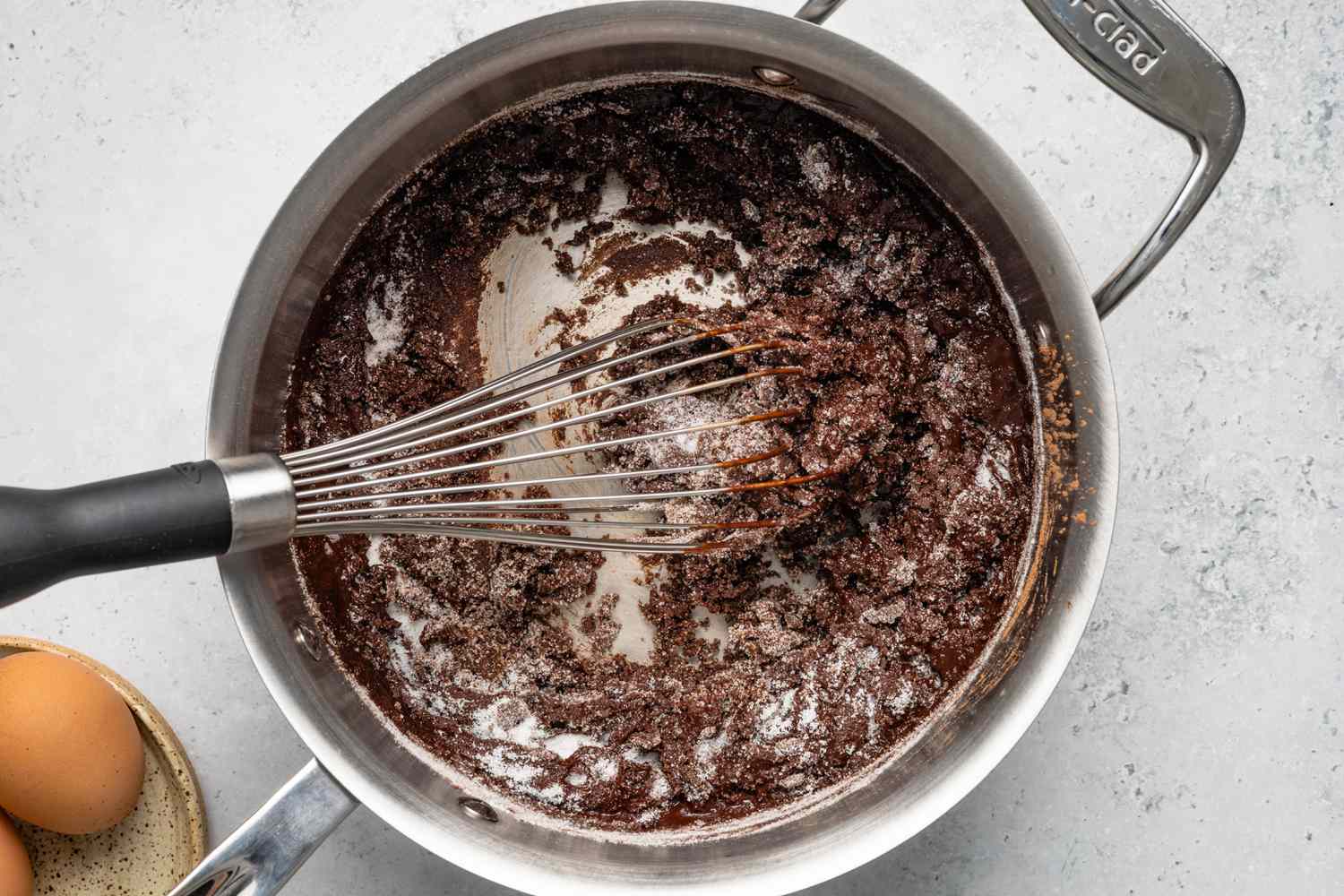 Cocoa Powder, Sugar, and Salt Whisked into Pot with Melted Butter 
