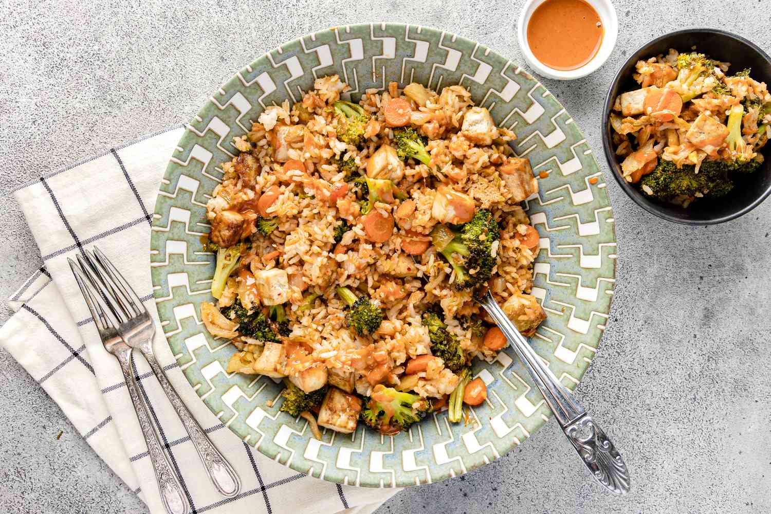 Sheet Pan Fried Rice in a Bowl with More in a Small Bowl