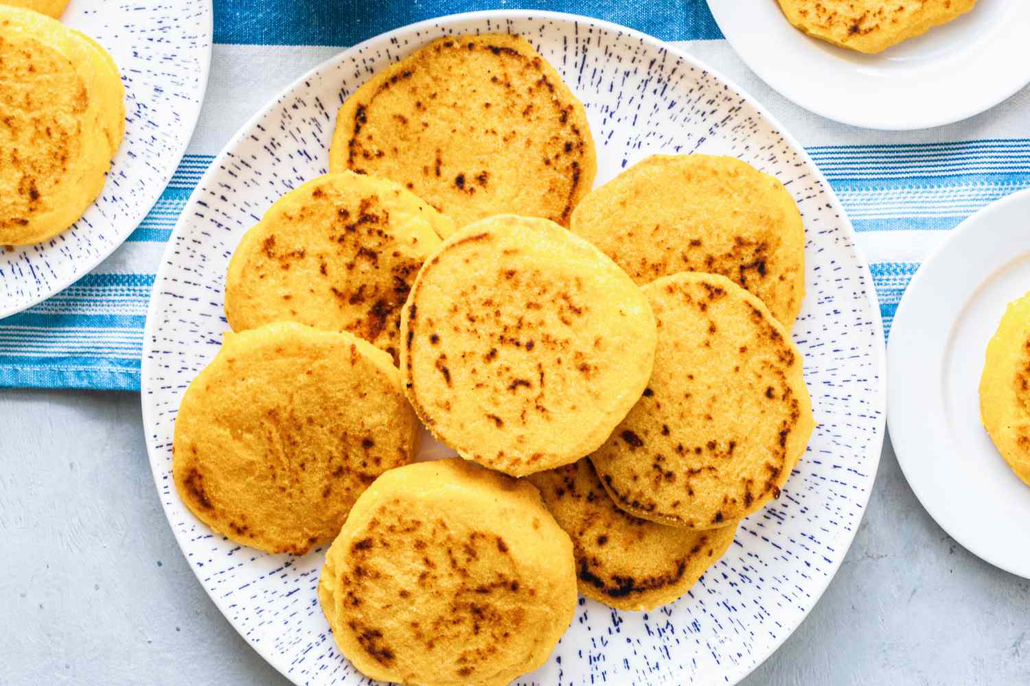 Arepas on a blue plate.